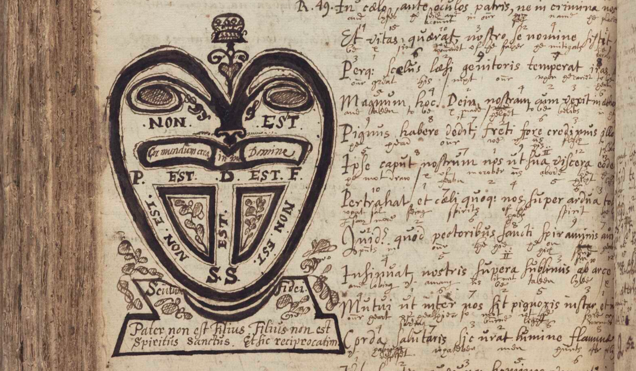 A close-up of a yellowed page from the commonbook showing a heart shape ink drawing with accompanying words.