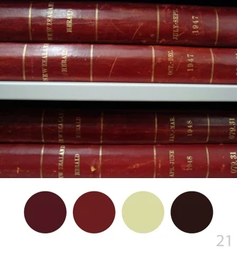 Four red book spines and a colour pallette.