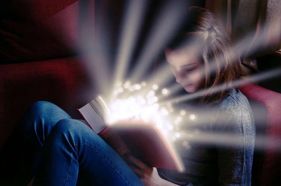 A girl reading a book.