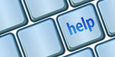 'Help' written on a key on a computer keyboard.