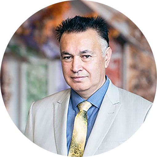 Māori man in suit and tie. 