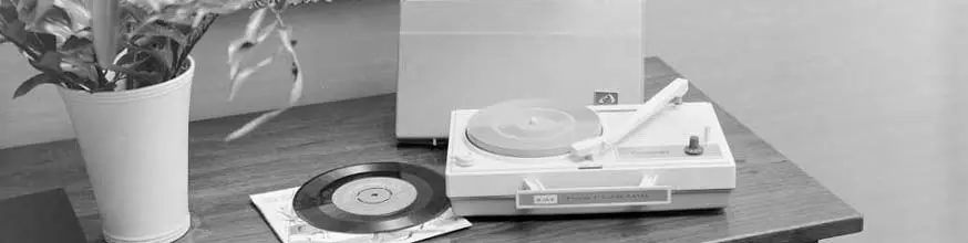 Record player and record on a table. 