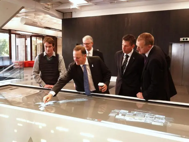 Prime Minister John Key exploring the Lifelines touch-table, November 2012.