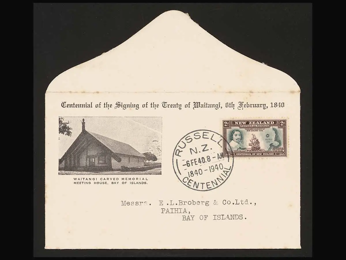 Envelope stamped at Russell on 6 February 1940. This first-day cover shows a photo of the Waitangi carved meeting house at the top left of the envelope and a 2d centennial NZ stamp showing Abel Tasman and Tasman's ship at the top right.