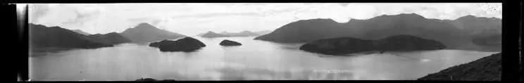 Entrance to Pelorus Sound, taken between 1923 and 1928, (top) and detail of the top right corner of this negative, showing dozens of pinholes (bottom).