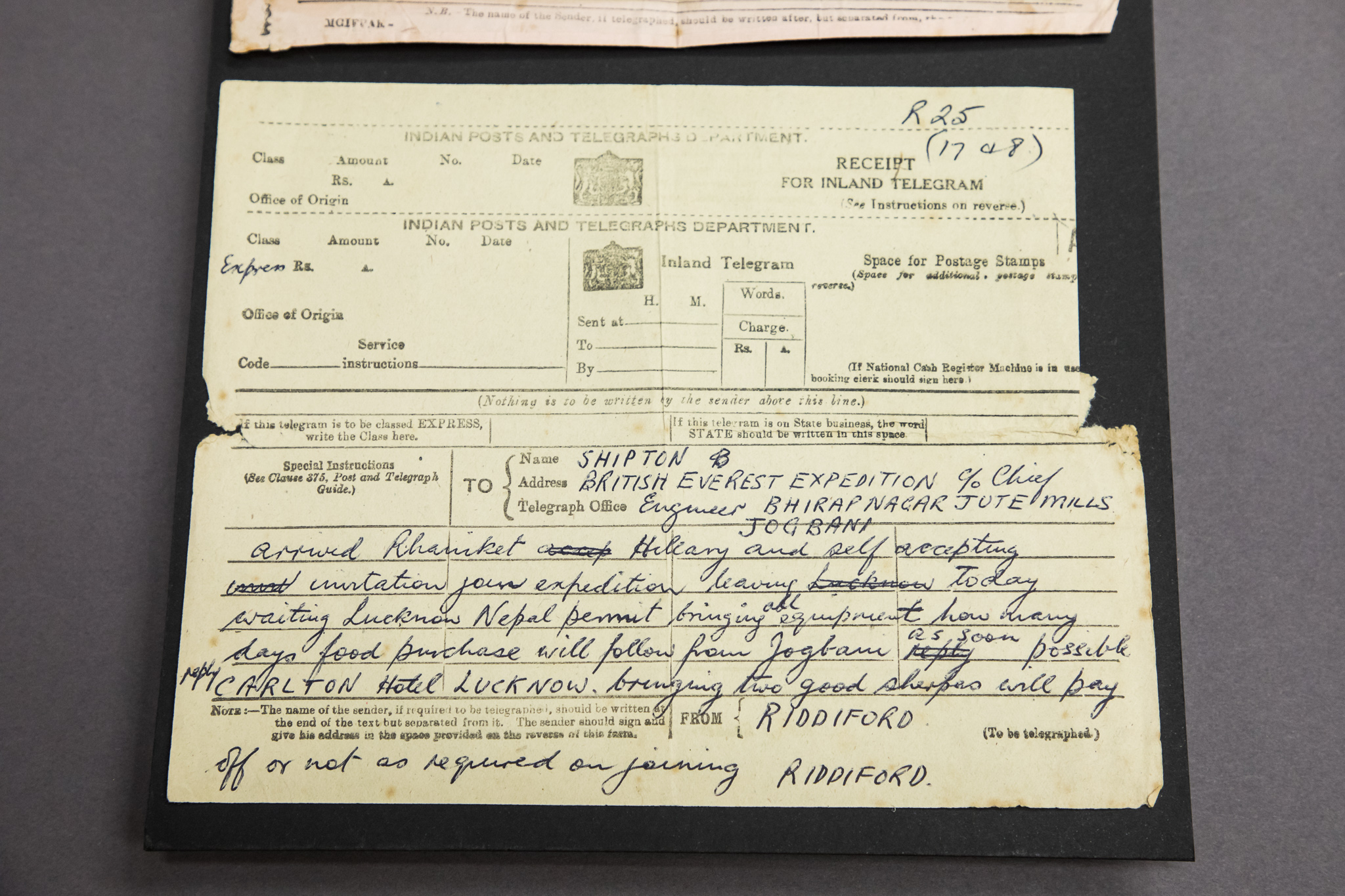 A telegram with a handwritten message.