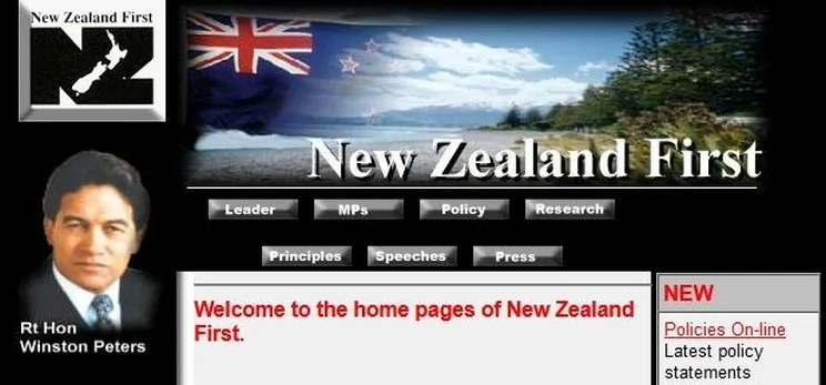 Screen grab of basic internet website from 1999 with black background and header image showing a shoreline, New Zealand flag, and on the left, a portrait of Winston Peters.