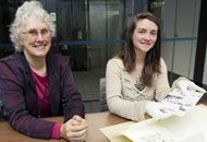 Staff member helping with research
