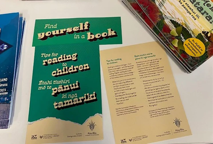 Pamphlets on a table about tips for reading to children. 