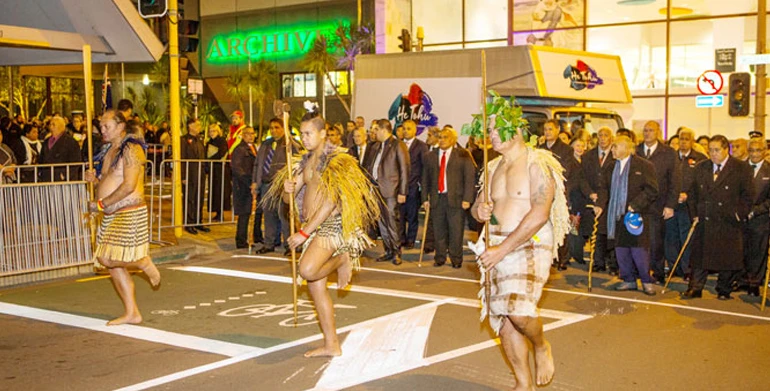 Māori warriors leading the move of the documents.