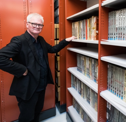 Flying Nun Records founder Roger Shepherd with a portion of the nearly 1,200 items included in this donation. Photo: Mark Beatty, ATL Imaging Services