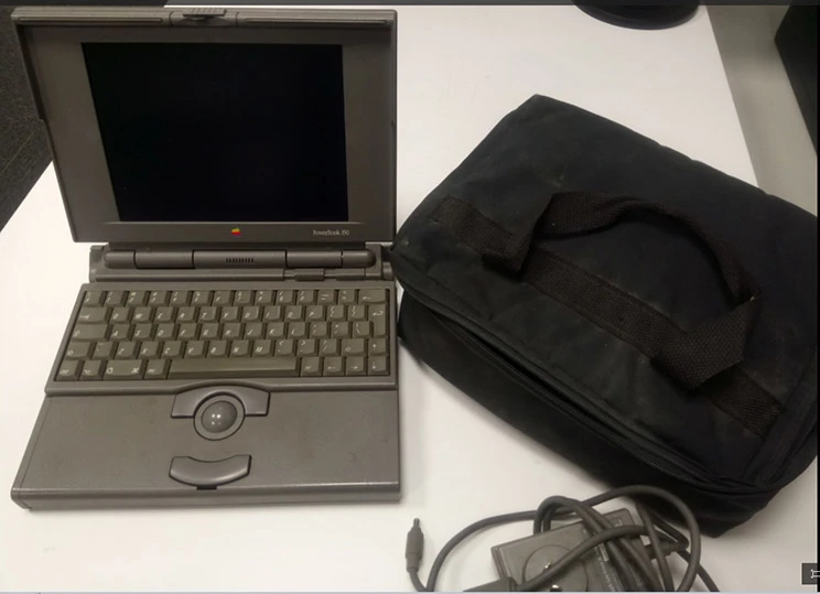 Powerbook 150 and laptop bag.