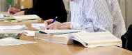 A person working at a desk. 