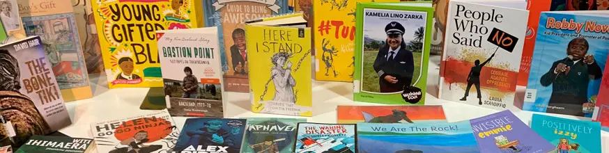 Colourful books on a table.
