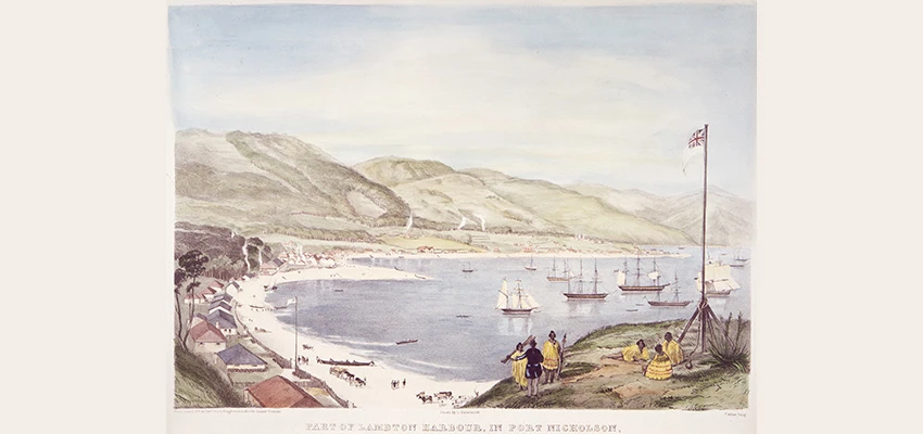 1841 painting of Lambton Harbour by Charles Heaphy showing settlement buildings, ships in the harbour, and Māori and early settlers on a hill overlooking the harbour 