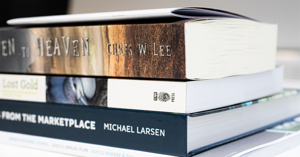 Stack of books on an angle.