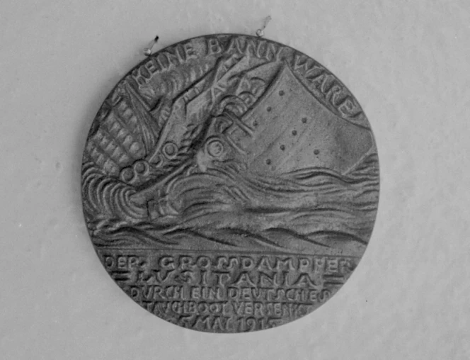 A 'Lusitania Medal' (either genuine or a copy). Negatives of the Evening Post newspaper.