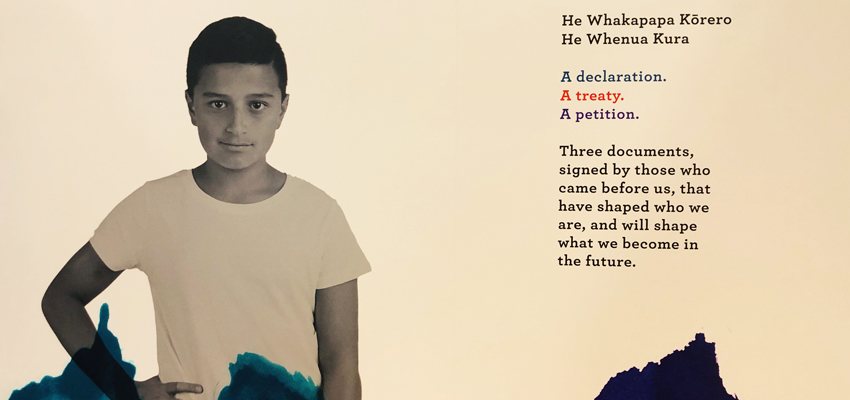 Image of boy alongside words about the He Tohu exhibition