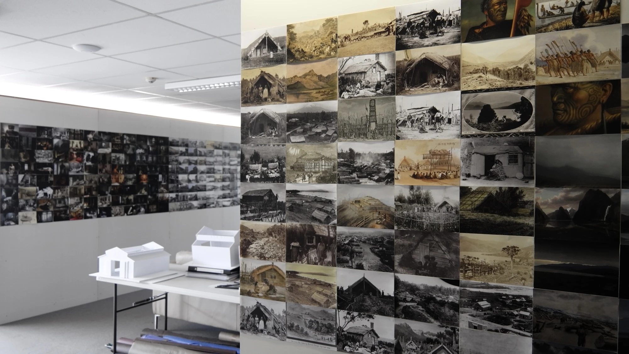 A wall of photos neatly arranged in a grid pattern showing a variety of scenes from the 1800s.