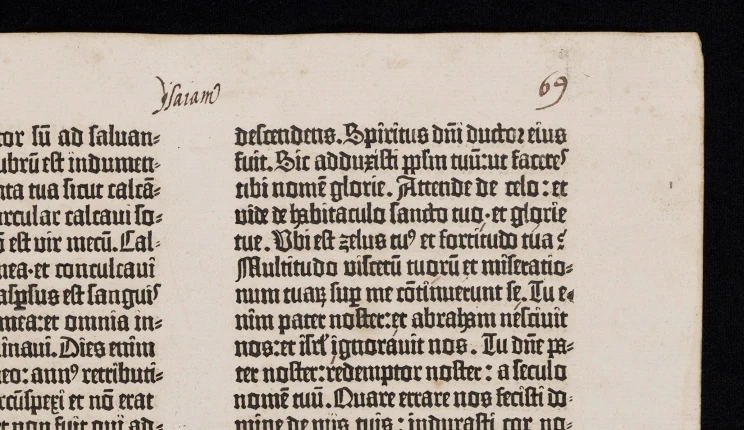 A closer look at the recto of the bible's printing quality showing just the upper right corner of the page.