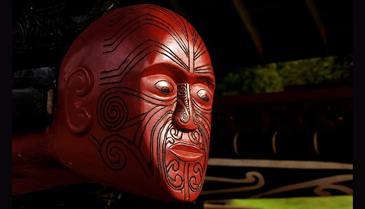 Carved figurehead on a war canoe at Waitangi, NZ