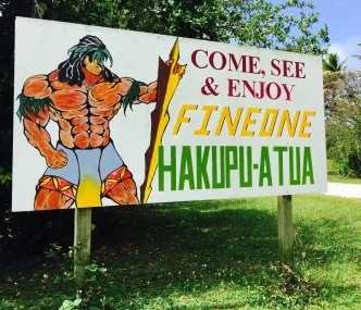 A sign in Hakupu Village saying  'Come, see & enjoy fineone Hakupu-atua'.