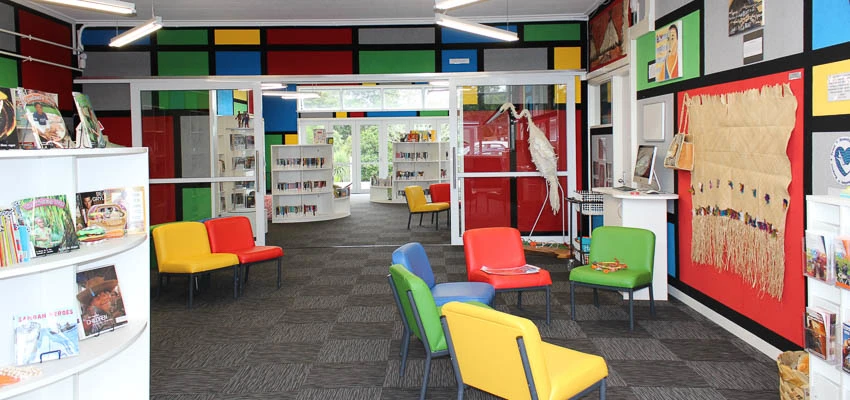 View through Bailey Rd school library to the outside deck