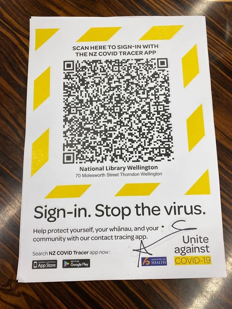 The Ministry of Health QR code for visitors to the National Library, with yellow border for improved visibility.