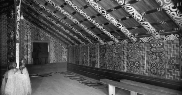 Meeting house interior at Muriwai, Gisborne, showing kowhaiwhai (Maori rafter panels). Date of photograph and photographer unknown. Possibly taken circa 1910.