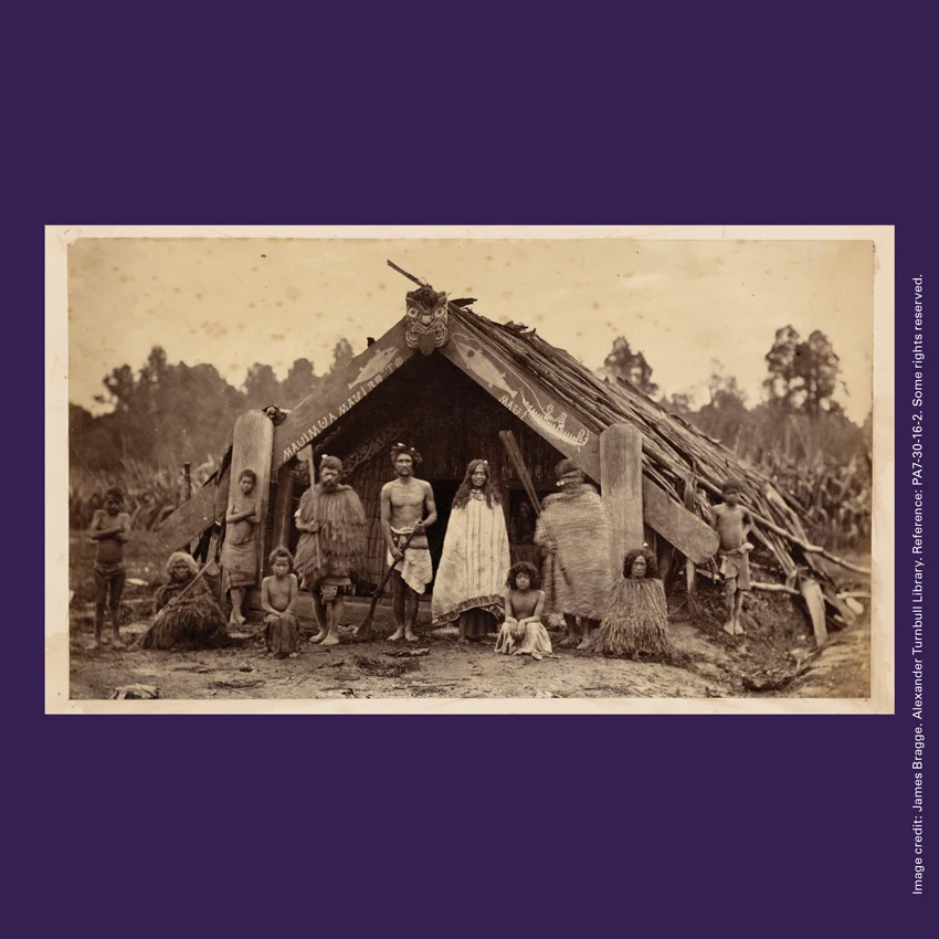 Front of curiosity card TMCC6 with an image of a group of Māori in front of a wharepuni (sleeping house)