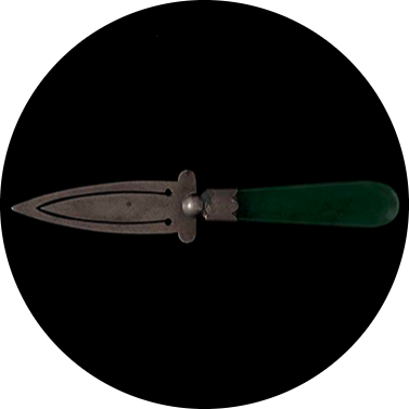 Small knife with a silver blade and greenstone handle.
