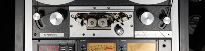 Tape spooling on a tape recorder in preparation for playback and digitisation.