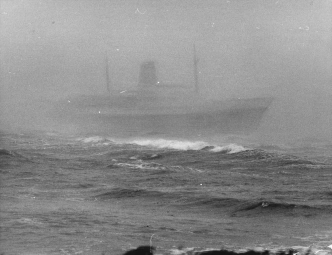 One of the few photographs of the Wahine upright taken from the shore.