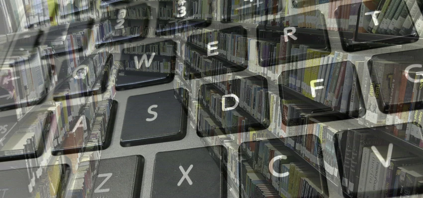 Image of keyboard superimposed on shelves of books in a library
