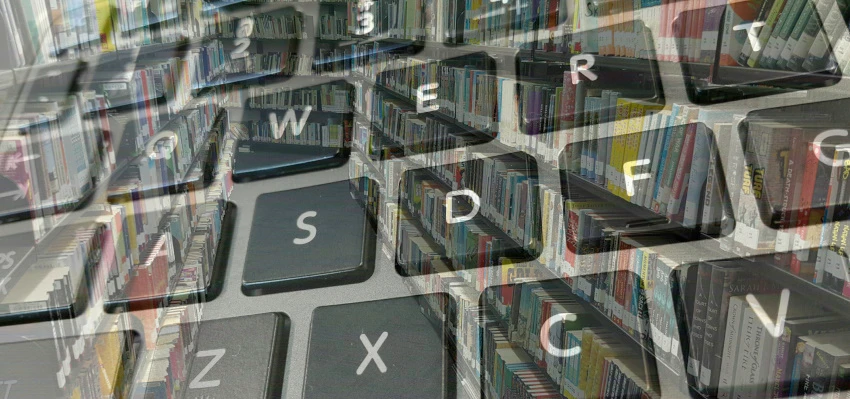 Image of keyboard superimposed on shelves of books in a library