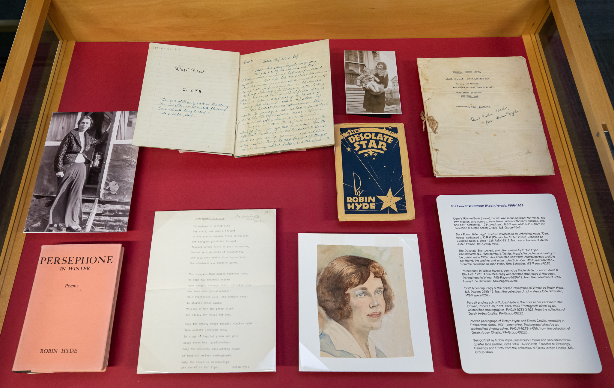 Images and other items from the collection in a glass display cabinaet