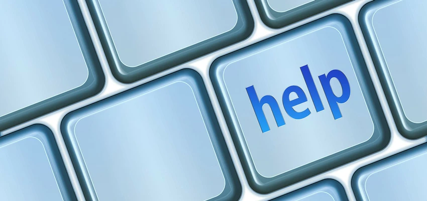 'Help' written on a key on a computer keyboard.