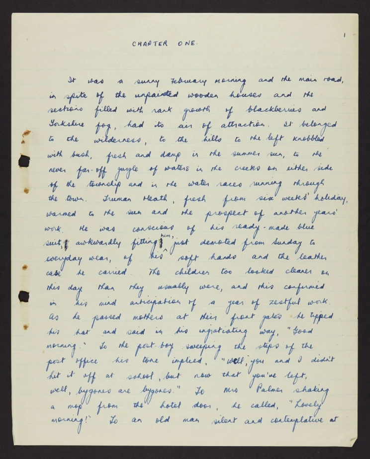 A lined page filled with handwritten words in blue ink and the words "Chapter One" at the top.