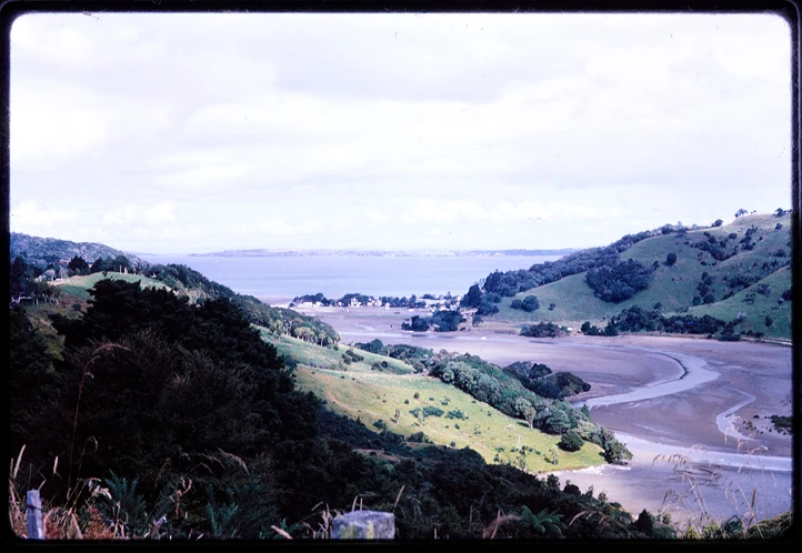 Colour slide of the estuary at Waiwera beach in 1965