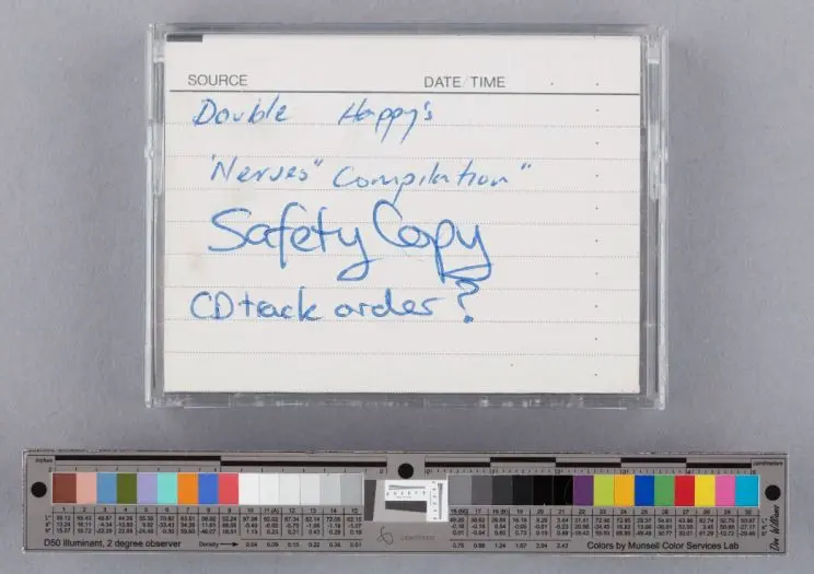 A DAT cover with handwritten notes about what is contained on the tape: "Double Happy's 'Nerves compilation' SAFETY COPY. CD track order?"