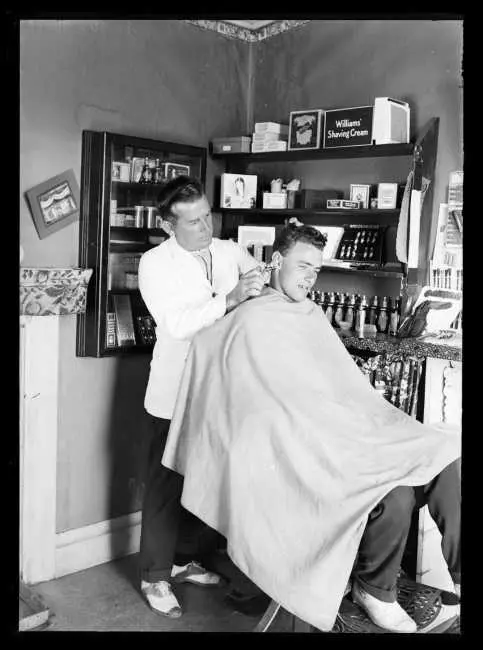 At the barber, c. 1931