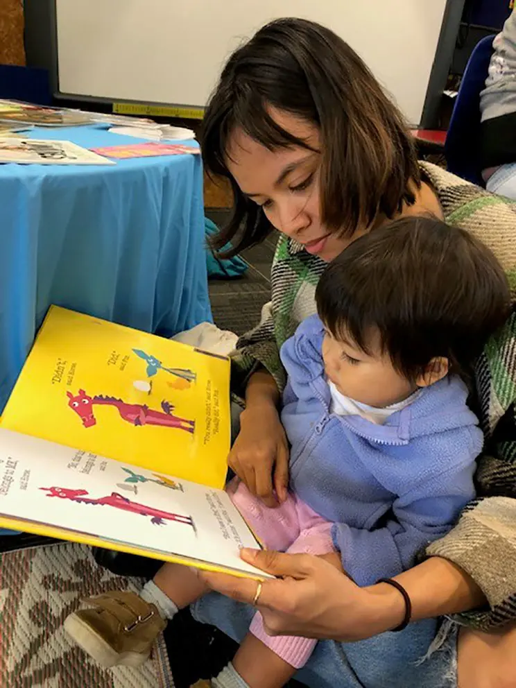 Woman and child reading