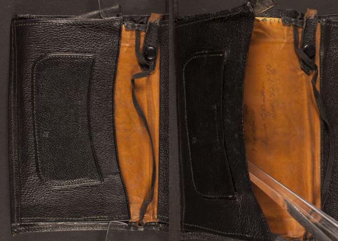Inside pocket of leather wallet.