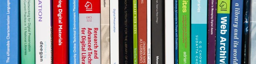 Spines of books about digital preservaton, titles include 'Web Archiving' and 'Research and Advanced Technology for Digital Libraries'.