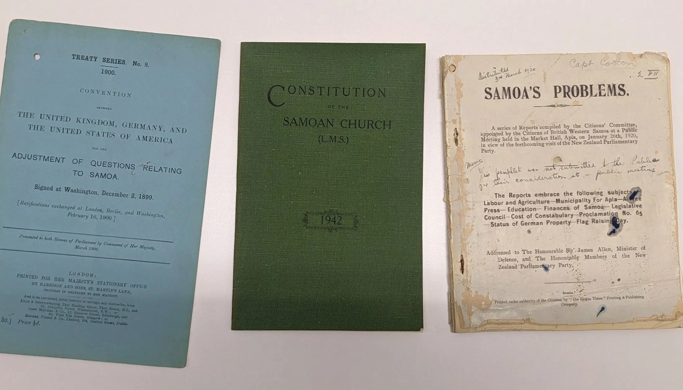 Three bound pamphlets with differing covers and contents. 