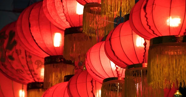 Rows of red paper lanterns.