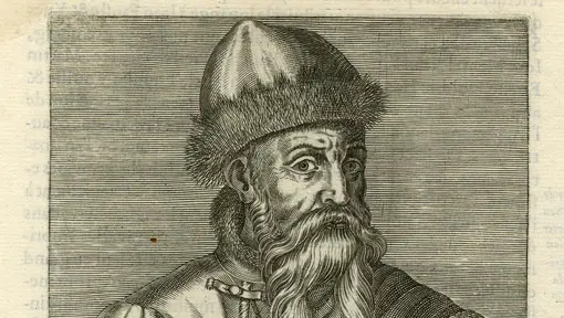 An engraving of a man with fur hat and long beard. 