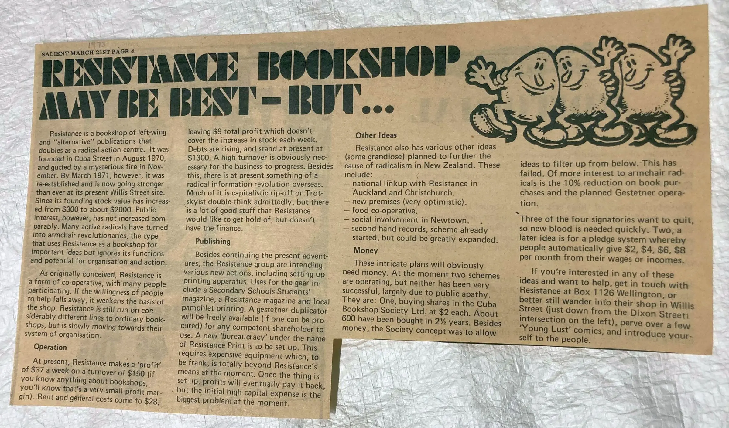 A yellowed newspaper clipping of an article.