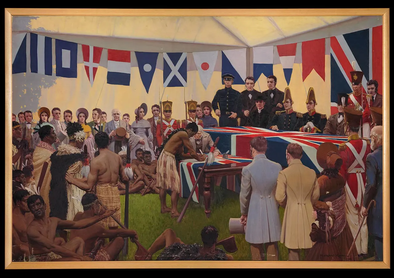 Oil colour painting showing Tāmati Wāka Nene signing the Treaty of Waitangi in front of James Busby, Captain William Hobson, other British officials, Māori and Europeans. The event is held in a tent draped with multi-coloured flags.