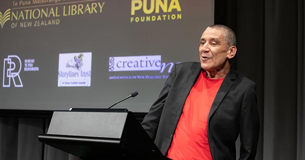 Ben Brown,  the inaugural Te Awhi Rito New Zealand Reading Ambassador, presenting his pānui at the National Library. Photo by Mark Beatty.